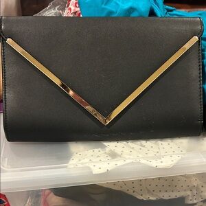 Elegant Black Clutch with Gold Accent